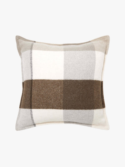 A plush Alby Cushion - Chocolate by L&M Home with a checkered pattern featuring shades of white, beige, and brown.