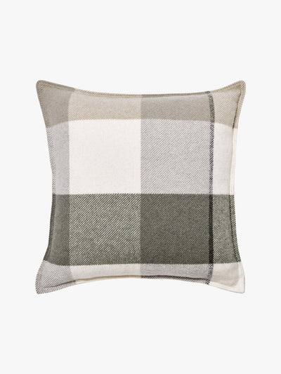 A cozy, checkered patterned L&M Home Alby Eucalypt cushion in neutral tones of white, grey, and green, isolated on a white background.