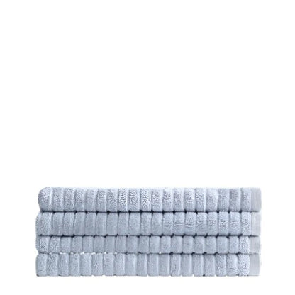 A neat stack of folded pale blue, eco-friendly Canningvale Alessia Cotton Bamboo Rib Hand Towels in Fresco Blue on a gray background.