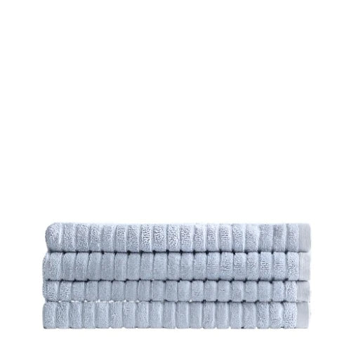 A neat stack of folded pale blue, eco-friendly Canningvale Alessia Cotton Bamboo Rib Hand Towels in Fresco Blue on a gray background.