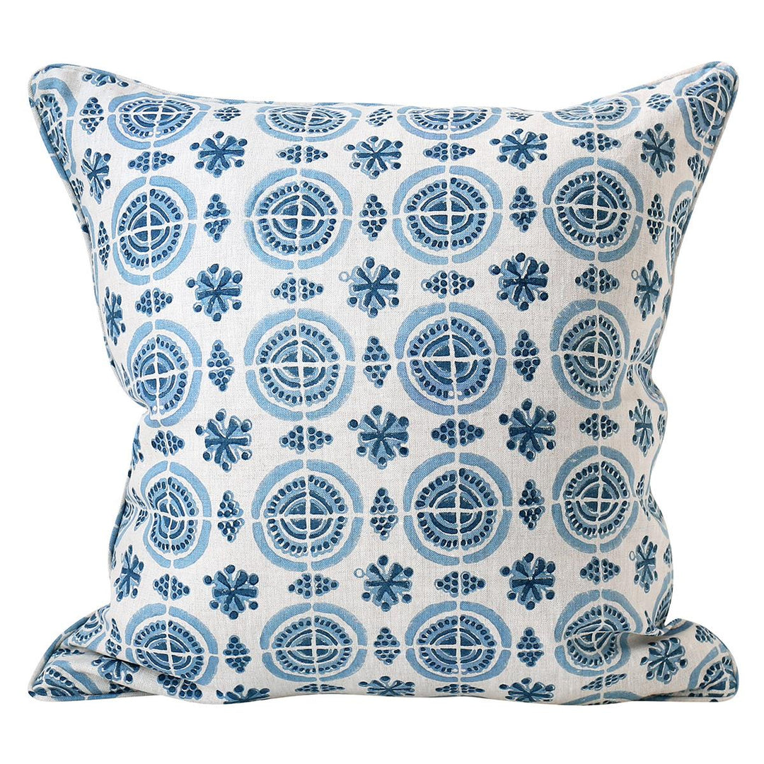 A decorative throw pillow with the Amreli Azure Cushion design from Walter G, hand block printed on 100% linen. Cushion insert included.