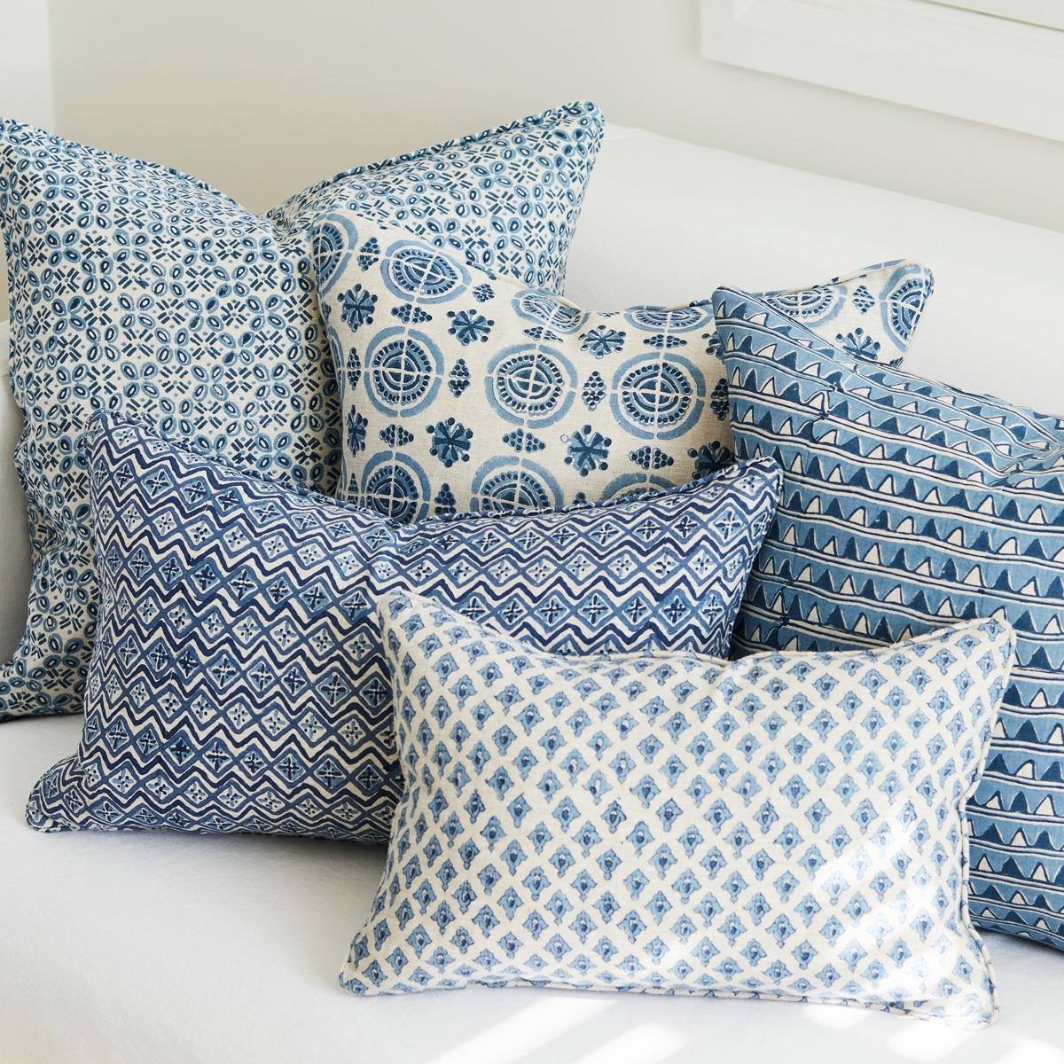 A decorative throw pillow with the Amreli Azure Cushion design from Walter G, hand block printed on 100% linen. Cushion insert included.